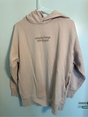 Uniqlo Light Blush Pullover Hoodie with 'Amazing Things Will Happen' Text